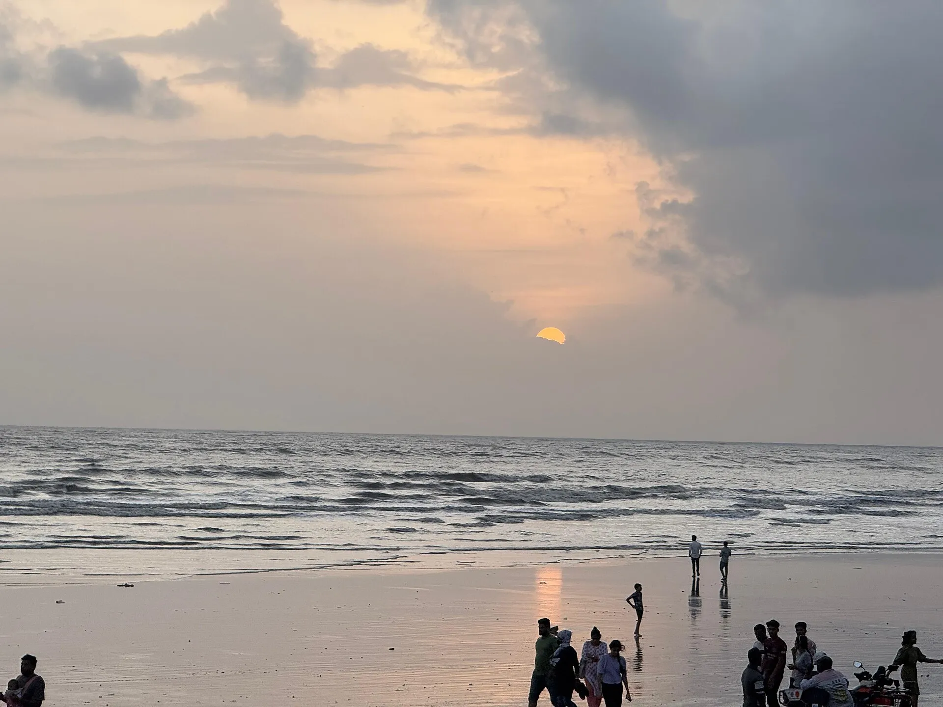 Golden-hour sunset over an Alibaug beach